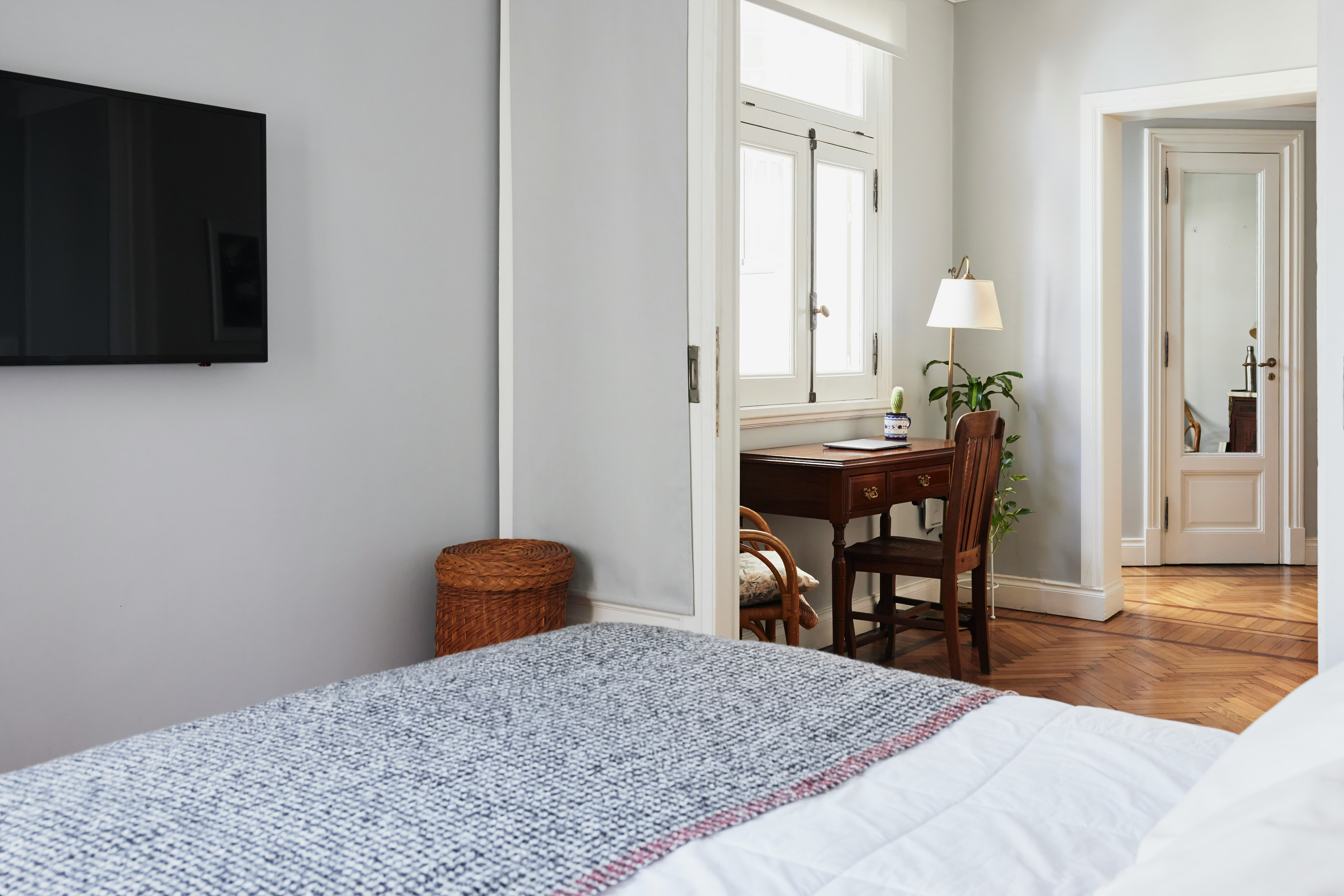 Bedroom with queen bed and wardrobe