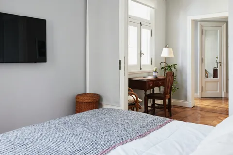Unit 102 — master bedroom with queen bed